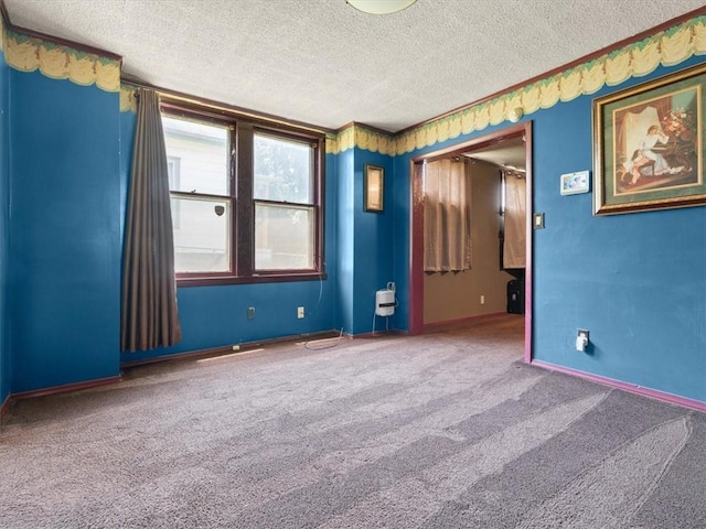 2605 S 15th St, Saint Joseph, MO 64503 - carpeted empty room featuring a textured ceiling