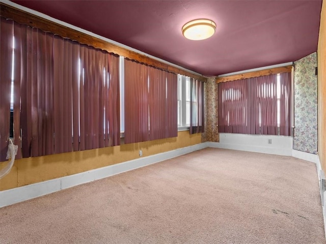 2605 S 15th St, Saint Joseph, MO 64503 - carpeted empty room featuring baseboards