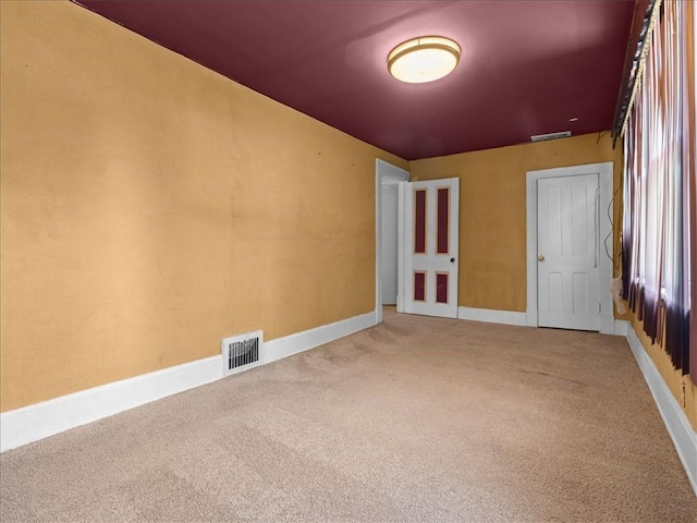 2605 S 15th St, Saint Joseph, MO 64503 - empty room with carpet floors and baseboards