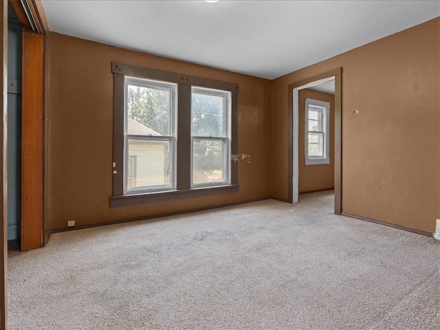 2605 S 15th St, Saint Joseph, MO 64503 - carpeted empty room with baseboards