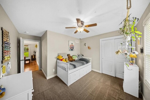 14115 NW 68th St, Parkville, MO 64152 - carpeted bedroom featuring a closet and a ceiling fan
