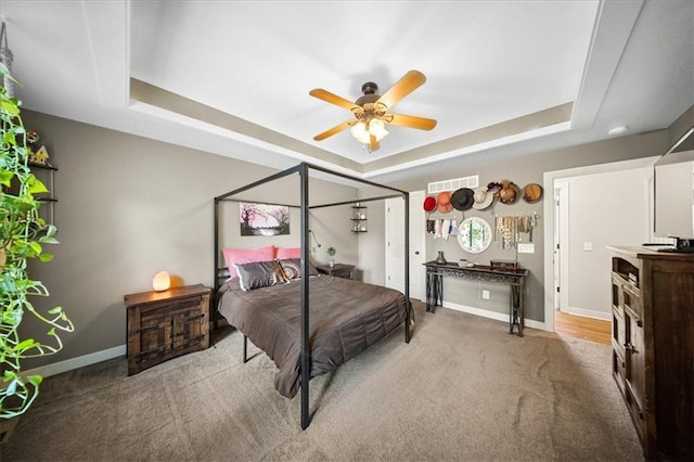 14115 NW 68th St, Parkville, MO 64152 - bedroom with a tray ceiling, carpet, and a ceiling fan