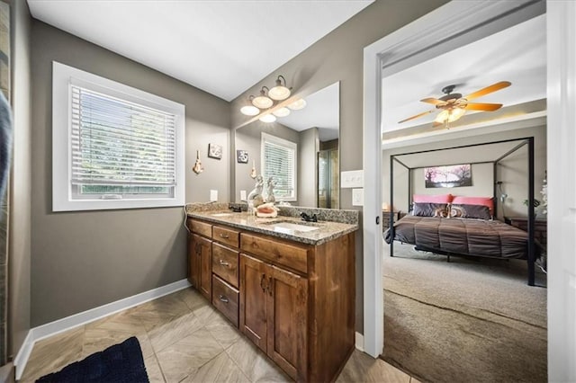 14115 NW 68th St, Parkville, MO 64152 - ensuite bathroom featuring double vanity and ceiling fan