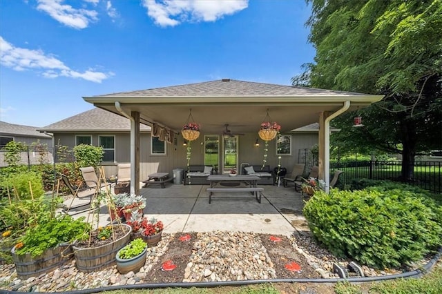 14115 NW 68th St, Parkville, MO 64152 - back of house with ceiling fan, a patio area, and an outdoor hangout area