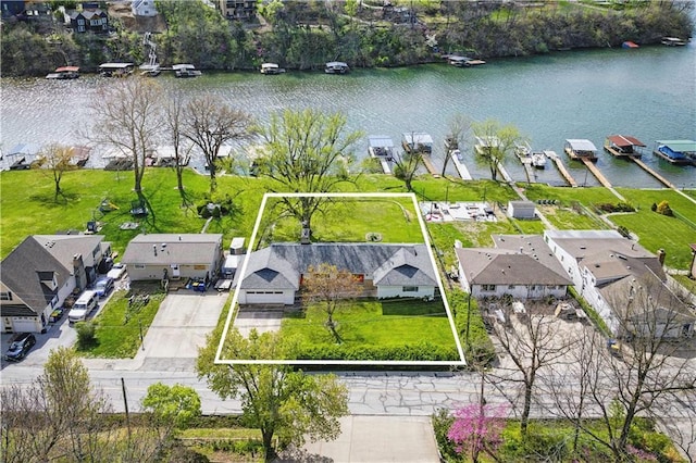 13 P Lake Shore Dr, Lake Lotawana, MO 64086 - aerial perspective of suburban area with a large body of water and property boundaries highlighted
