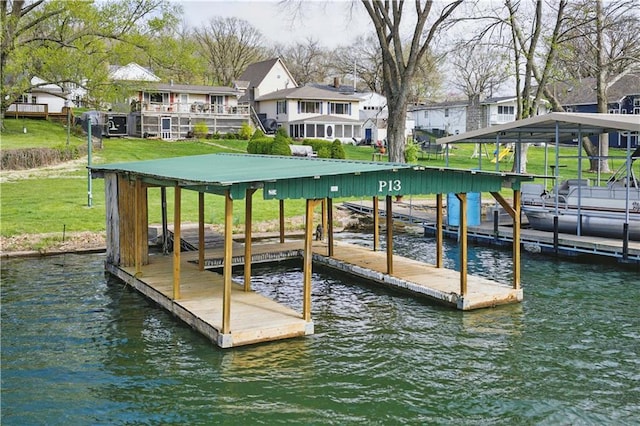 13 P Lake Shore Dr, Lake Lotawana, MO 64086 - dock area with a water view, a residential view, and a yard