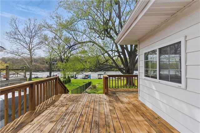 13 P Lake Shore Dr, Lake Lotawana, MO 64086 - deck with a lawn and a water view