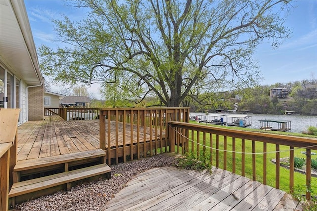 13 P Lake Shore Dr, Lake Lotawana, MO 64086 - wooden terrace featuring a lawn