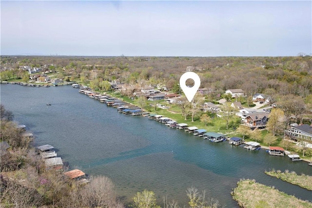 13 P Lake Shore Dr, Lake Lotawana, MO 64086 - aerial view of property and surrounding area featuring a nearby body of water and nearby suburban area