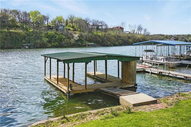 13 P Lake Shore Dr, Lake Lotawana, MO 64086 - dock area featuring a water view