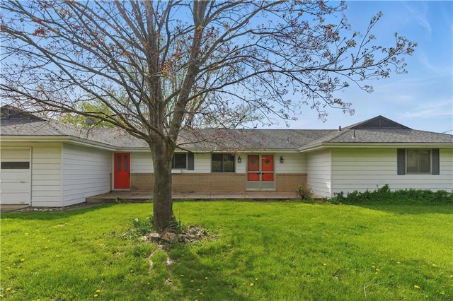13 P Lake Shore Dr, Lake Lotawana, MO 64086 - ranch-style house featuring an attached garage, a front lawn, and brick siding