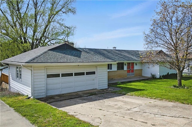 13 P Lake Shore Dr, Lake Lotawana, MO 64086 - ranch-style house with concrete driveway, a chimney, a front lawn, an attached garage, and roof with shingles