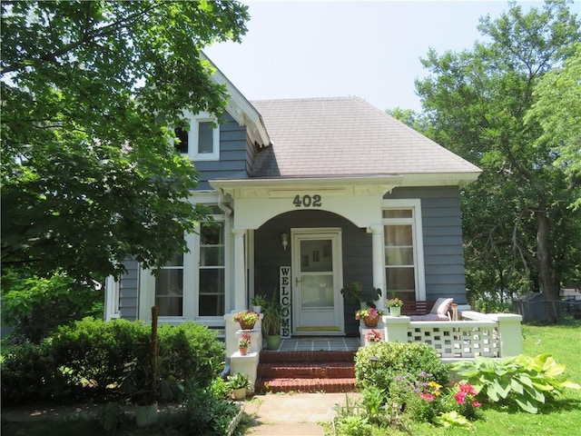 402 N Pearl St, Paola, KS 66071 - entrance to property featuring covered porch