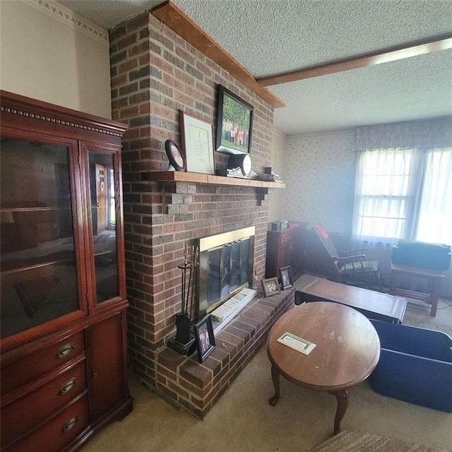 503 Hickory St, Richmond, MO 64085 - living area featuring a textured ceiling, a fireplace, and carpet floors