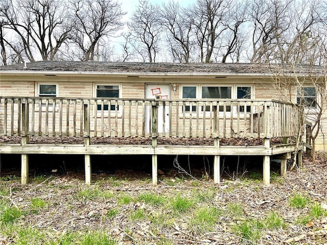 606 K 20th Hwy, Horton, KS 66439 - back of property featuring a wooden deck and brick siding