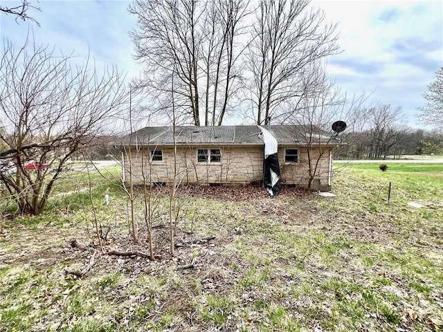 606 K 20th Hwy, Horton, KS 66439 - rear view of property with crawl space