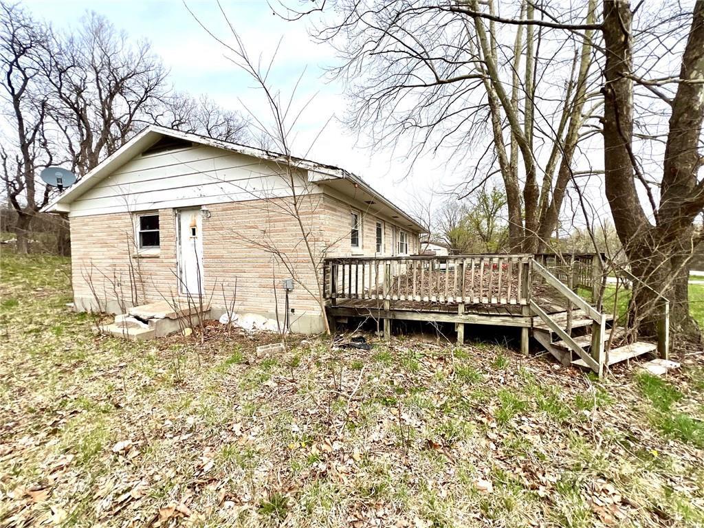 606 K 20th Hwy, Horton, KS 66439 - back of property featuring a wooden deck