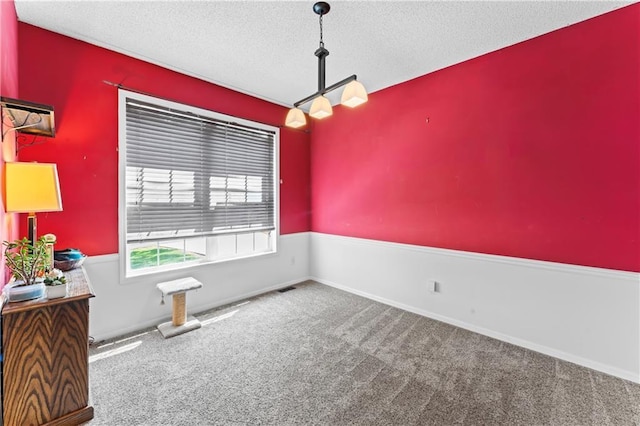 20112 W 220th St, Spring Hill, KS 66083 - spare room with carpet flooring and a textured ceiling