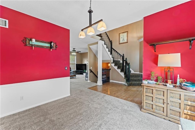 20112 W 220th St, Spring Hill, KS 66083 - entrance foyer featuring carpet, ceiling fan, and stairs