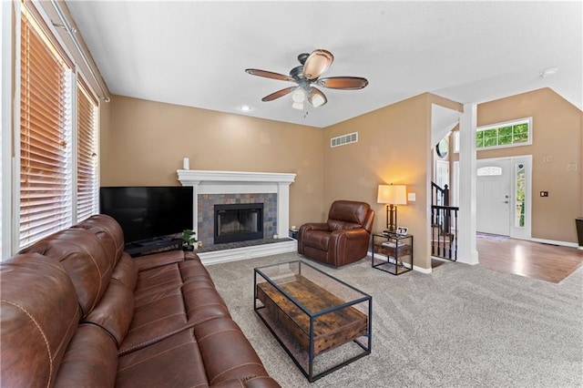 20112 W 220th St, Spring Hill, KS 66083 - living room with carpet floors, healthy amount of natural light, ceiling fan, and a tile fireplace