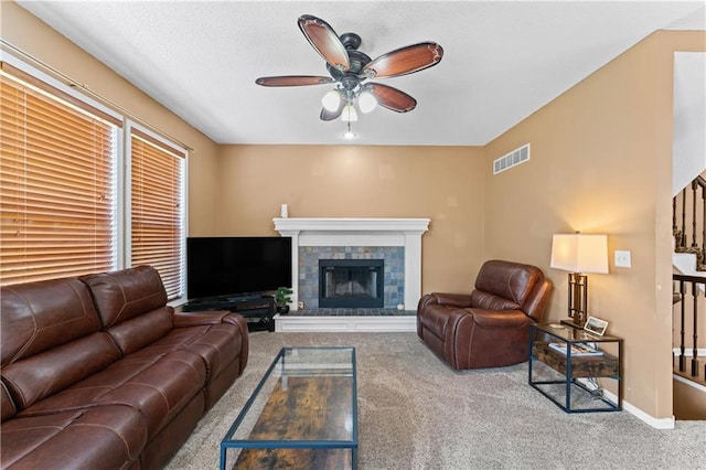 20112 W 220th St, Spring Hill, KS 66083 - carpeted living area with ceiling fan and a fireplace