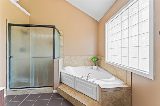 20112 W 220th St, Spring Hill, KS 66083 - full bath with vaulted ceiling, a stall shower, a garden tub, and tile patterned flooring