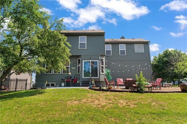 20112 W 220th St, Spring Hill, KS 66083 - rear view of house featuring a patio, an outdoor fire pit, and entry steps