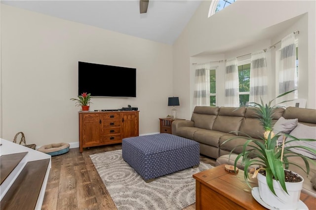 15375 Roger Rd, Leavenworth, KS 66048 - living area featuring dark wood finished floors, ceiling fan, and high vaulted ceiling