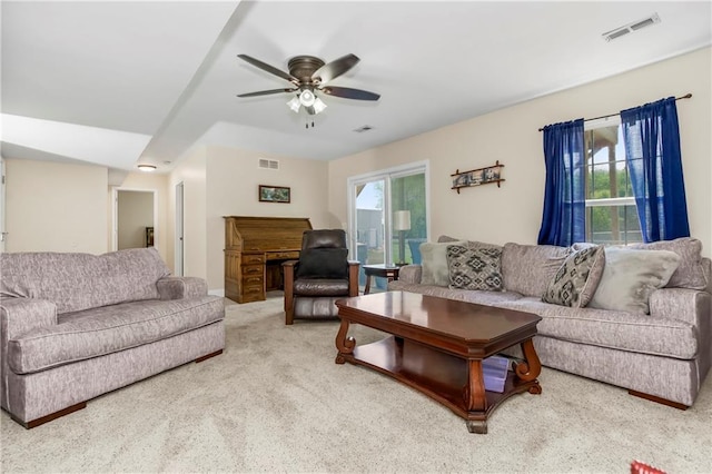 15375 Roger Rd, Leavenworth, KS 66048 - carpeted living room with a ceiling fan