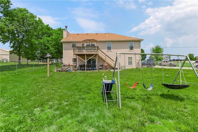 15375 Roger Rd, Leavenworth, KS 66048 - back of property with stairway, a wooden deck, and a chimney