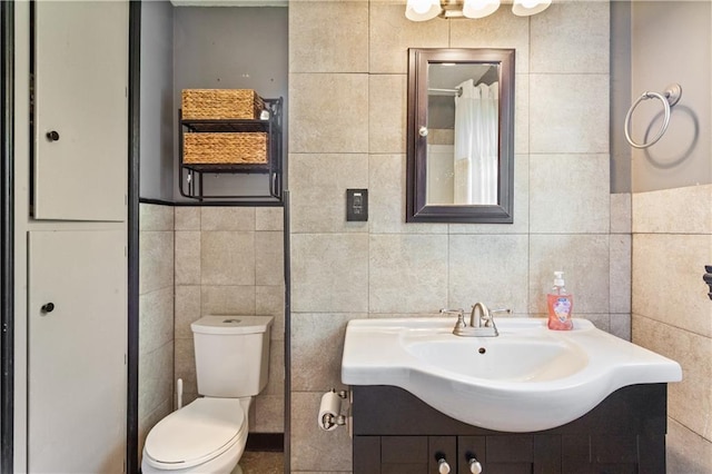 12603 E 37th St N, Sugar Creek, MO 64050 - full bathroom featuring tile walls, vanity, and a shower with shower curtain