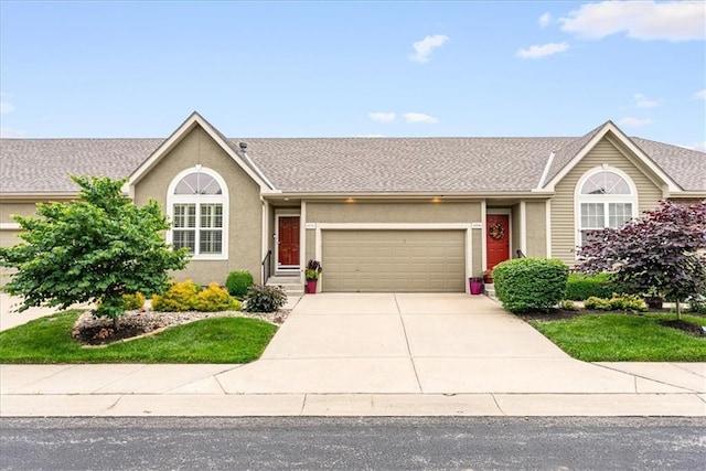 15723 W 61st Ter, Shawnee, KS 66217 - single story home with an attached garage, driveway, and stucco siding