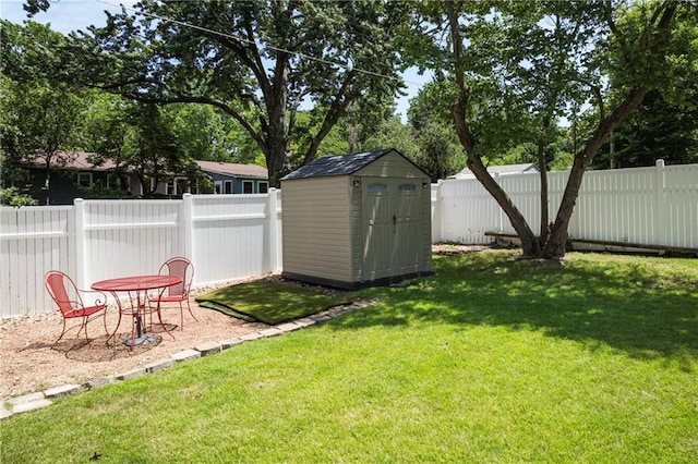 315 Goodrich Dr, Warrensburg, MO 64093 - fenced backyard featuring a storage shed