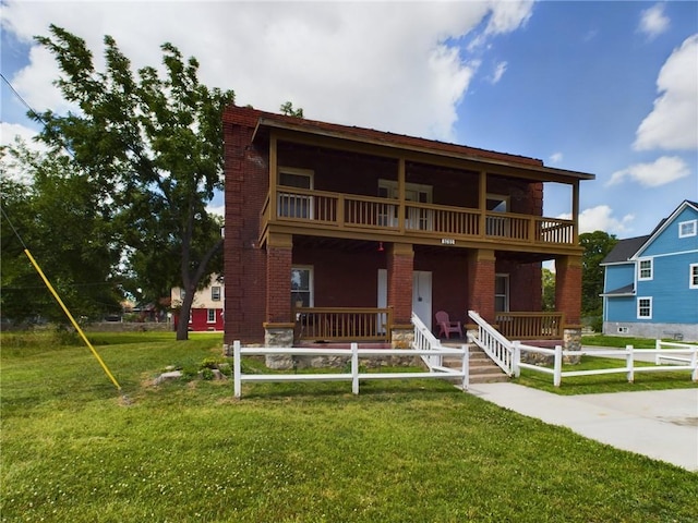 2416 E 22nd St, Kansas City, MO 64127 - view of front of property with a porch and brick siding