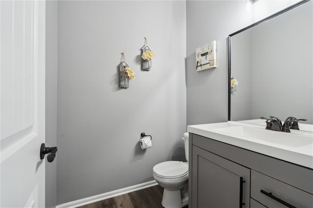 514 NE Viewpark Dr, Lees Summit, MO 64086 - bathroom featuring vanity and wood finished floors