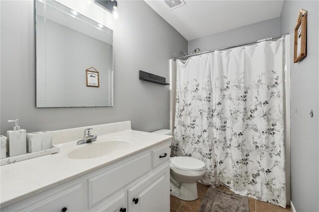 514 NE Viewpark Dr, Lees Summit, MO 64086 - full bathroom with vanity, tile patterned flooring, and a shower with shower curtain