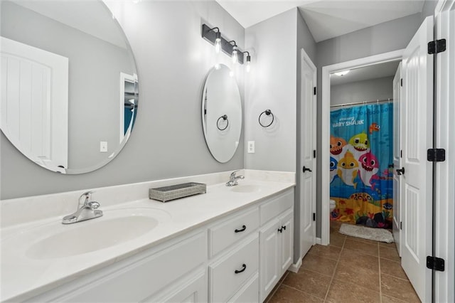 514 NE Viewpark Dr, Lees Summit, MO 64086 - bathroom featuring double vanity and a shower with curtain