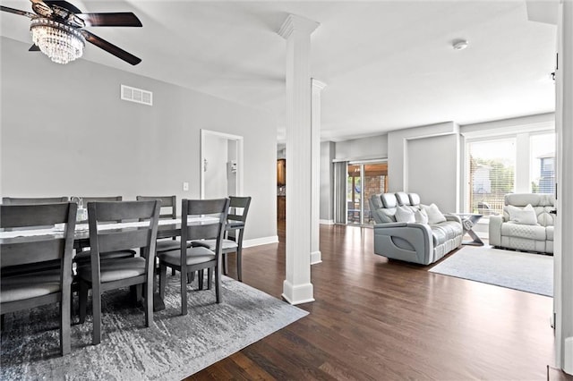 514 NE Viewpark Dr, Lees Summit, MO 64086 - dining area featuring decorative columns, ceiling fan, and wood finished floors