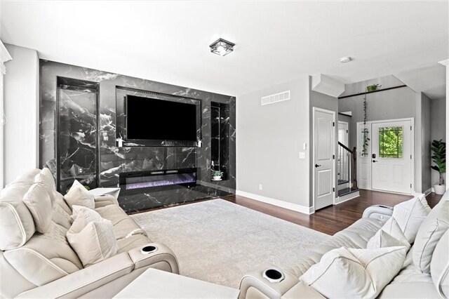 514 NE Viewpark Dr, Lees Summit, MO 64086 - living room featuring wood finished floors and stairway