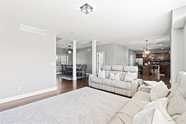 514 NE Viewpark Dr, Lees Summit, MO 64086 - living room with a ceiling fan, dark wood finished floors, a chandelier, and recessed lighting
