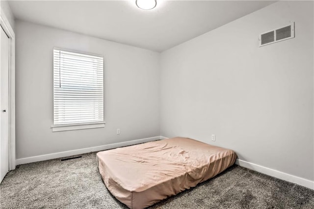 2004 NE Wien Ave, Blue Springs, MO 64029 - carpeted bedroom featuring baseboards and a closet