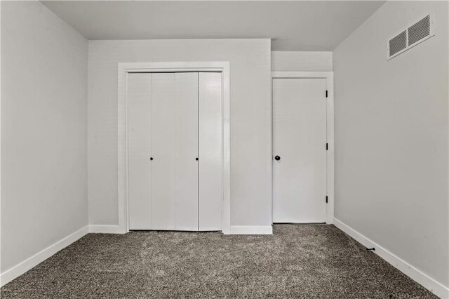 2004 NE Wien Ave, Blue Springs, MO 64029 - unfurnished bedroom with carpet and a closet