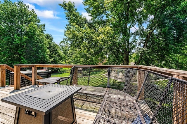 2004 NE Wien Ave, Blue Springs, MO 64029 - wooden terrace with outdoor dining area