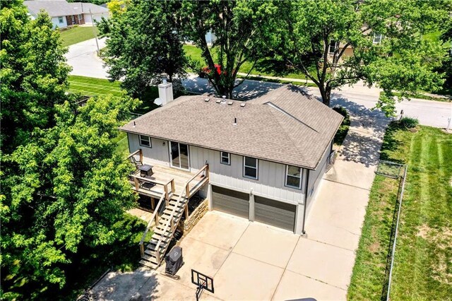2004 NE Wien Ave, Blue Springs, MO 64029 - aerial view of property and surrounding area with a tree filled landscape