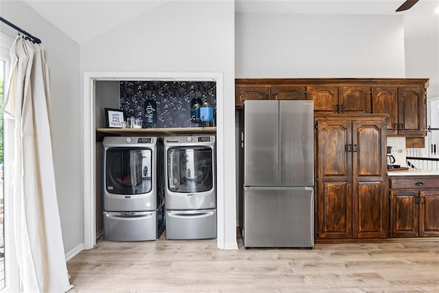 29500 W 184th St, Gardner, KS 66030 - laundry area with washer and dryer, light wood-style flooring, and ceiling fan