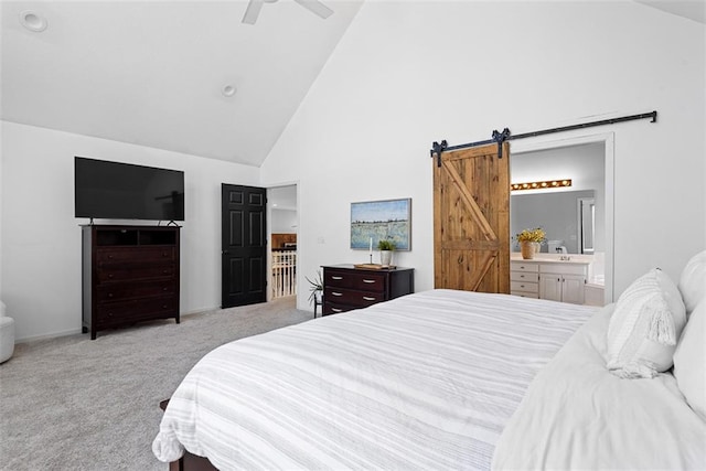 29500 W 184th St, Gardner, KS 66030 - carpeted bedroom featuring high vaulted ceiling, a barn door, ensuite bath, and ceiling fan