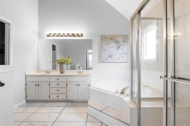 29500 W 184th St, Gardner, KS 66030 - full bathroom with double vanity, a garden tub, marble look tiles, lofted ceiling, and a shower stall