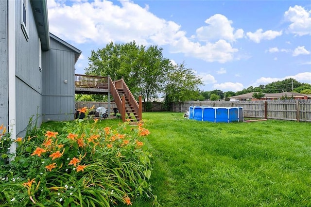 29500 W 184th St, Gardner, KS 66030 - fenced backyard featuring stairs and a wooden deck