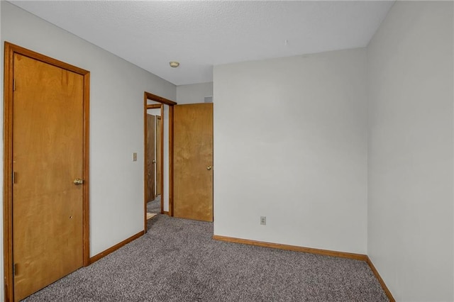 22005 Gracie Dr, Peculiar, MO 64078 - unfurnished bedroom featuring carpet flooring and baseboards