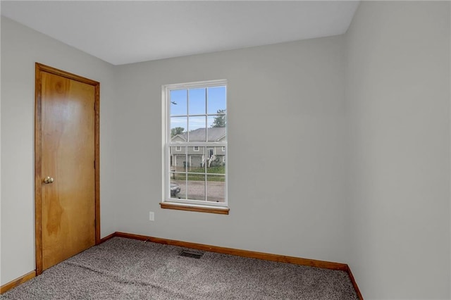 22005 Gracie Dr, Peculiar, MO 64078 - carpeted spare room featuring baseboards